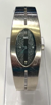 Reloj pulsera Roots Canada para mujer acero inoxidable cepillado batería nueva Foto 1 de 4