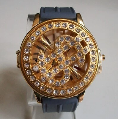 RELOJ HOMBRE $ SIGNO PIEDRA MODA HIP HOP SPINNER ACABADO DORADO GRIS SILICONA Foto 1 de 4