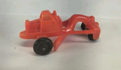 Juguete tractor vintage de plástico rojo Manoil 3" Foto 1 de 4