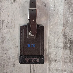 Bolsa de equipaje grande de cuero Tumi etiqueta de identificación en marrón - Imagen 1 de 6
