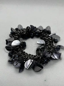 DIVERTIDO LLAMATIVO Y NOISEY Pulsera Elástica Cuentas Corte Negro y Lentejuelas Plata Brillo - Imagen 1 de 4