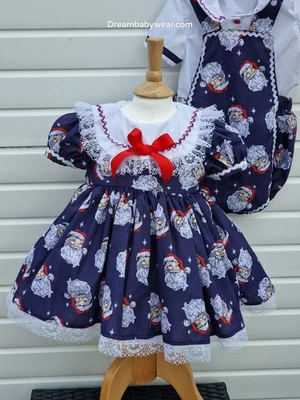 DREAM 0-8 years BABY GIRLS Navy fatherCchristmas  traditional  twirly bow dress - Image 1 of 4