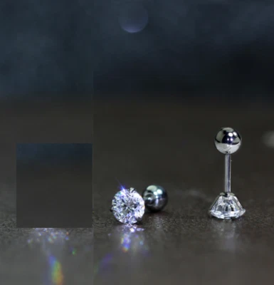 Aretes hipoalergénicos de titanio de acero quirúrgico redondo circonita cúbica con tornillo posterior PE31 Foto 1 de 4