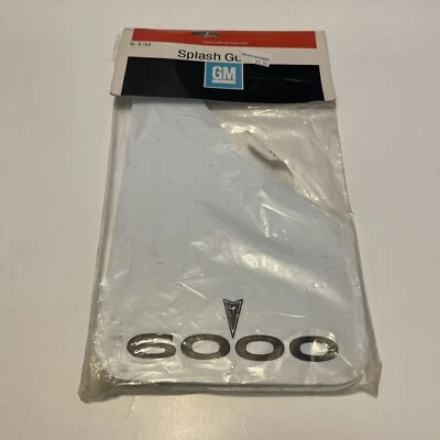 Juego de guardabarros protectores contra salpicaduras blancos Pontiac 6000 parte #997998 NOS GM 1982-91 Foto 1 de 3