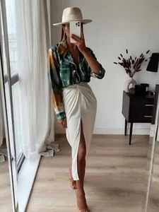 Falda Zara efecto satinado nudo marfil midi talla XS - Imagen 1 de 5