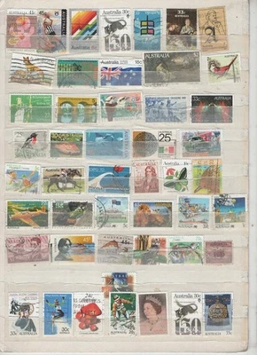 AUSTRALIA:100 SELLOS POSTALES DIFERENTES,USADOS,FUERA DE PAPEL.WHT U C IS WHT U OBTIENES. Foto 1 de 2