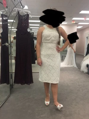 Vestido de cóctel hasta la rodilla Foto 1 de 4