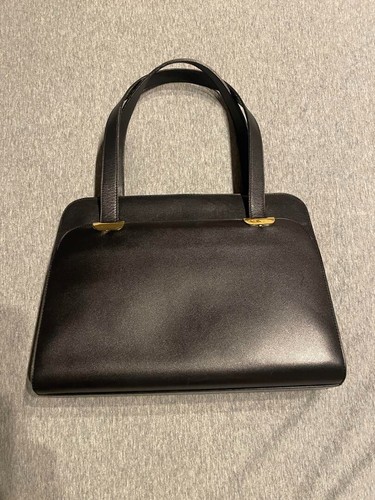 Sac à main Christian Dior logo CD cuir noir occasion
