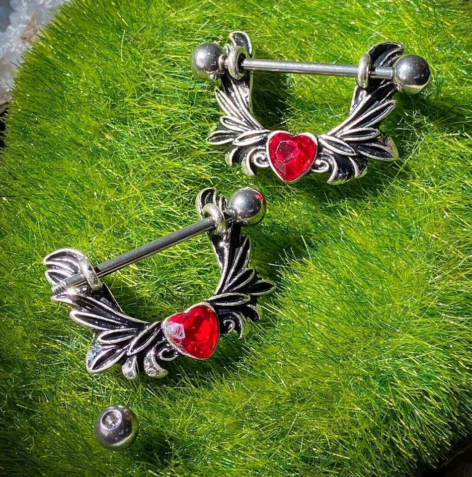 PAR de anillos de pezón con alas de ángel de corazón de cristal escudos calibre 14 g joyería corporal Foto 1 de 1