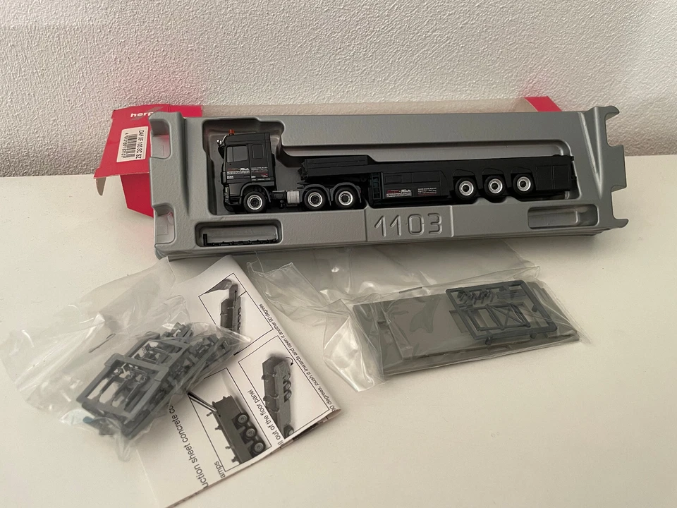 Herpa H0 LKW DAF mit Betonteileauflieger - Bild 1 von 1