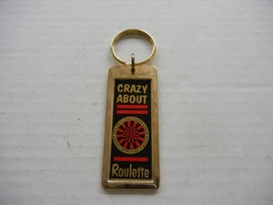 VINTAGE CRAZY ABOUT ROULETTE METAL KEYCHAIN - Picture 1 of 4