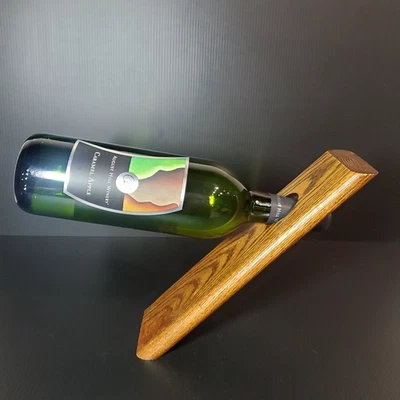 Balancing wine bottle holder, holds a single bottle, solid oak wood - Image 1 of 4