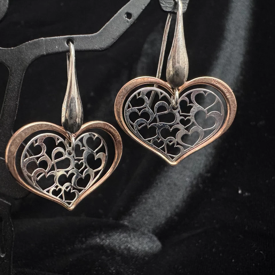NOMINACIÓN - PENDIENTES COLGANTES CORAZÓN TONO PLATA DE LEY + ORO Foto 1 de 4