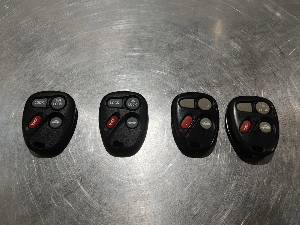 Lot of 4 GM 10246215 Replace Key Fobs Remotes for Impala Monte Carlo Grand Prix - Image 1 of 2