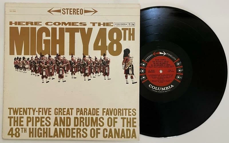Here Comes The Mighty 48th 25 Great Parade Favorites LP M- 6i Columbia CS-8338 - Image 1 of 2
