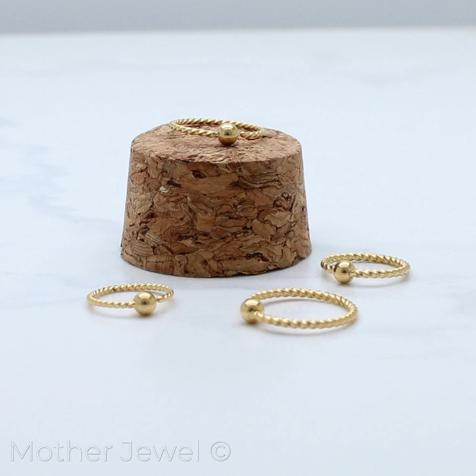 ANILLO CAUTIVO TORRE CEÑIDO ORO AMARILLO ACERO QUIRÚRGICO CBR OREJA NARIZ LABIO TABIQUE HÉLICE Foto 1 de 3