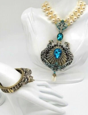 Collar y brazalete Heidi Daus Swarovski cristal y marfil perla jaguar Foto 1 de 4