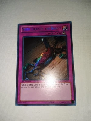 Seven Tools of the Bandit - NM - LCYW-EN089 - 1st Edition - Secret Rare Nice Con - Image 1 of 4