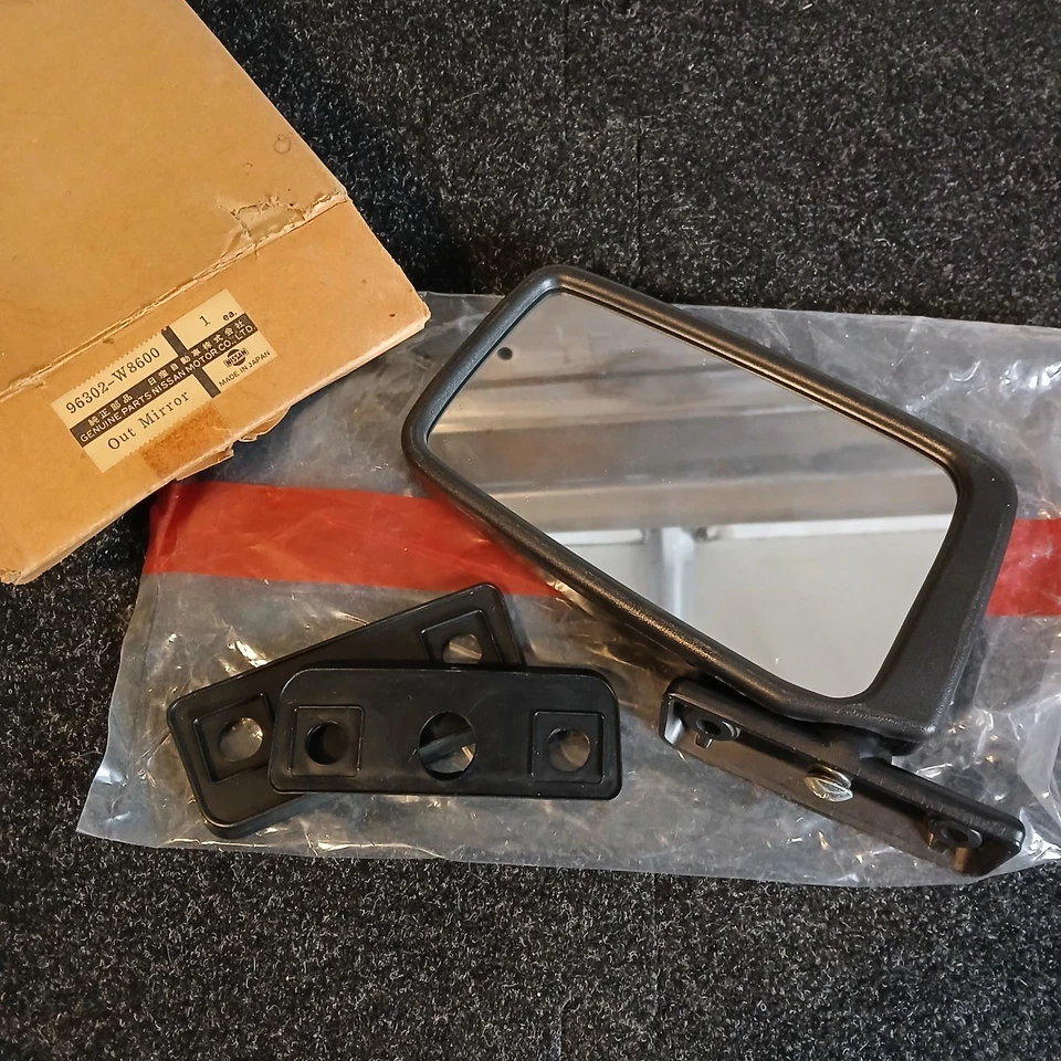 Conjunto de espejo retrovisor lateral Datsun 240Z 280Z 1974-1978 LH NOS OEM 96302-W8600 Foto 1 de 4