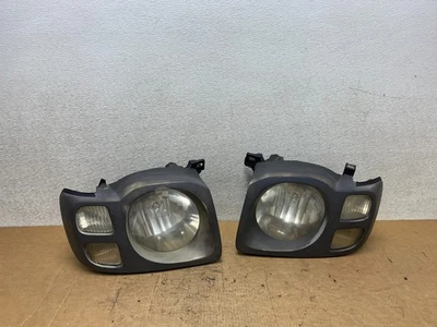 Faros laterales izquierdo+derecho Nissan Xterra 2002 2003 2004 OEM T5044 DW Foto 1 de 4