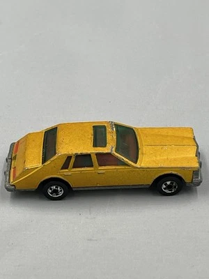 De colección Hot Wheels Cadillac Seville Metalflake Dorado Rojo Inter. Mattel 1980 Hong Kong Foto 1 de 4