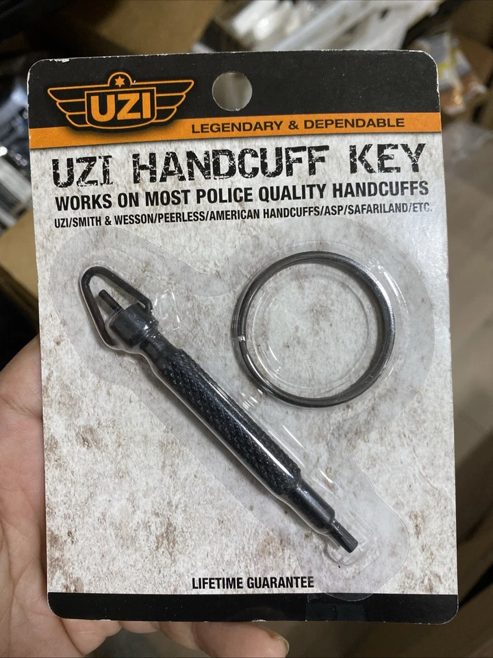 Llave esposada giratoria UZI con llaveros pequeños y grandes #UZI-KEY-ROTATE Foto 1 de 1
