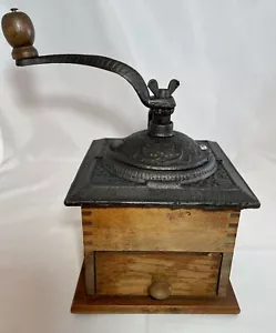 VINTAGE KAFFEEMÜHLE SCHWALBENSCHWANZHOLZ MIT SCHUBLADE & VERZIERTES GUSSEISEN TOP - Bild 1 von 10