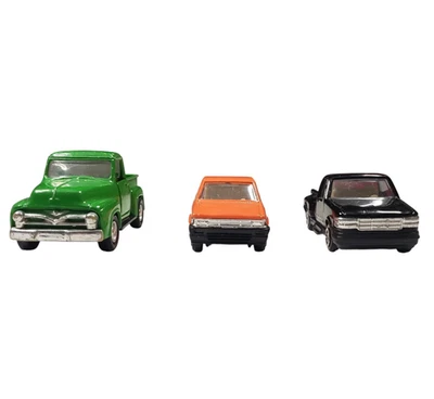 Lote de 3 camionetas pickup Dodge y Ford vintage sin marca de juguete naranja verde negro Foto 1 de 4