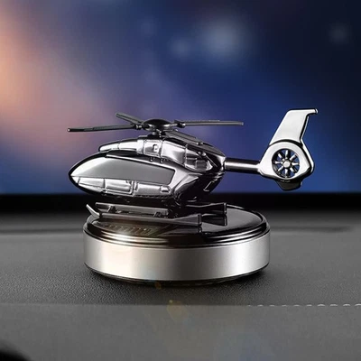 Ambientador de aire solar para automóvil energía solar helicóptero giratorio difusor de aroma para automóvil Foto 1 de 4