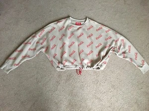 Stylish Coca cola drawstring fleece top with logos UK12/14 in Good condition - Picture 1 of 6