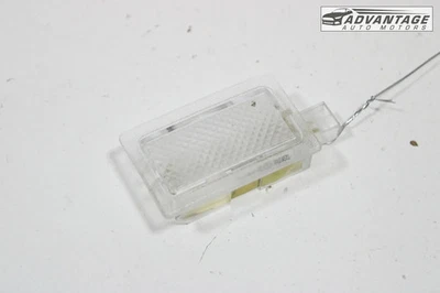 Cargador Dodge 2012-2023 panel puerta delantera izquierda interior cortesía luz lámpara OEM Foto 1 de 4