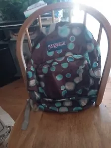 Mochila Jansport marrón azulada con diseño de círculos - Imagen 1 de 9