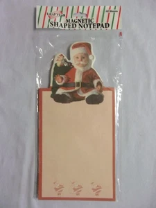 Weihnachten magnetisch geformter Notizblock - Baby als Weihnachtsmann verkleidet mit Geschenksack Neu in Verpackung - Bild 1 von 2