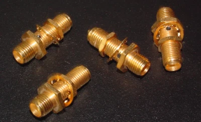 LOTE de 4 acoplamientos de mampara ITT-CANNON-SEALECTRO 050-675-0000890 DORADO DOBLE SMA-F Foto 1 de 3