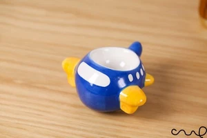 NUEVO Pintado a Mano Lindo Estilo Retro Cerámica Azul Avión Huevo Portavasos Regalo - Imagen 1 de 4