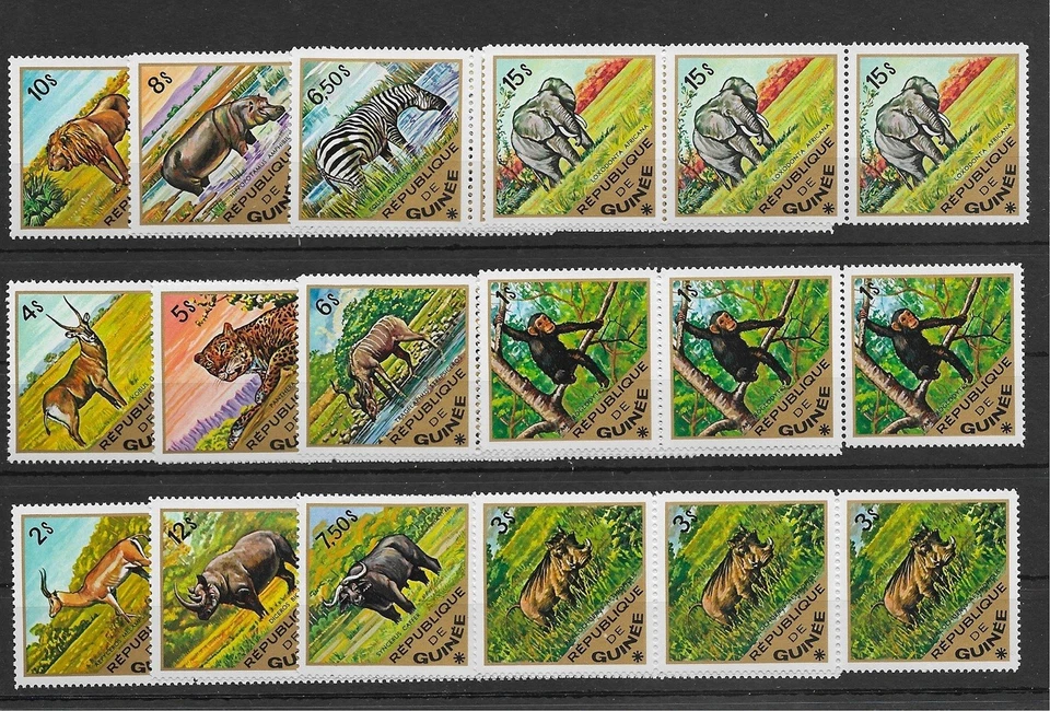 SMT, 1975, GUINEA: Juego completo de doce animales africanos en banda de 3, MNH Foto 1 de 1