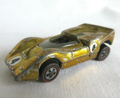 Hot Wheels De Colección 1:64 1968 Redline McLaren M6A Spectra Gold EE. UU. MUY BUENO EN MUY BUEN ESTADO Foto 1 de 4