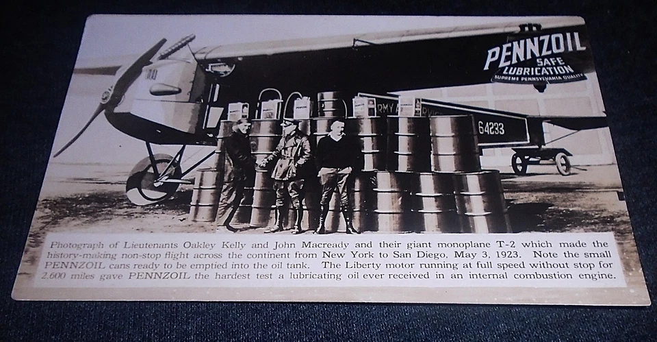 RARO 1922 Pennzoil óleo de motor e monoplano avião voo e pilhas de latas de óleo - Imagem 1 de 1