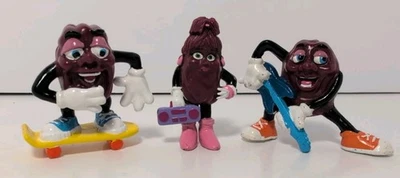 Lote De 3 Figuras De Colección 1988 California Raisins Patinador, Guitarra y Boombox Foto 1 de 3
