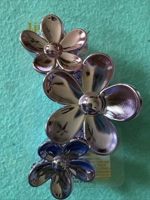 Garra de pelo púrpura de tres flores Foto 1 de 4