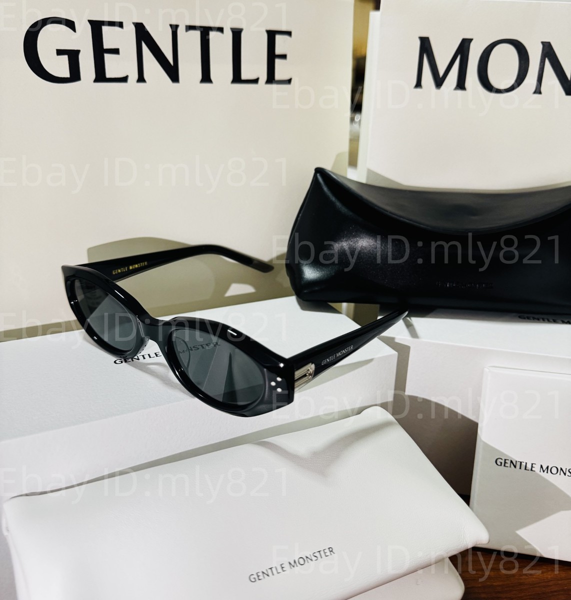 GENTLE MONSTER TAMBU ブラック キャットアイ サン 28019724_57526760_1000.jpg
