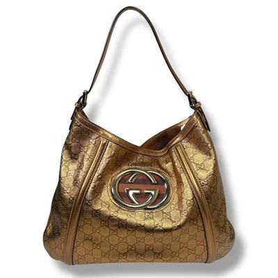 Auténtico bolso de hombro y tote Gucci metálico Guccissima Britt Foto 1 de 4