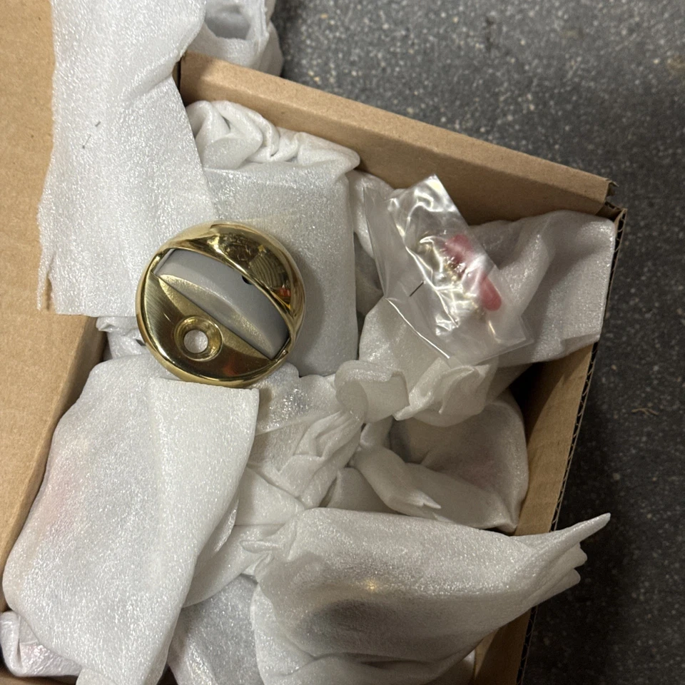 Tope de puerta de cúpula baja Rockwood 440 13 piezas latón brillante 1-1/8" altura con herrajes Foto 1 de 4