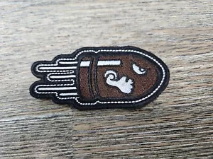 NEW Brown Bullet Bill Speedo Super Mario Iron On Patch 3 3/8" Angry Flying - Picture 1 of 6