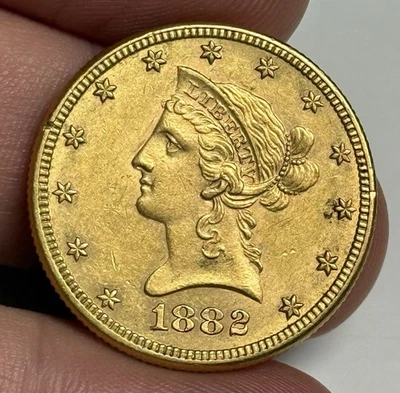 XF 1882-P $10 Liberty Head Gold Eagle (minor rim damage) U.S. Coin Extra Fine - Image 1 of 3