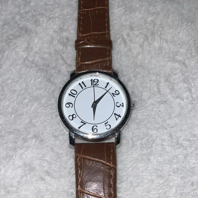 Reloj Hombre Calvin Hill Tono Plata Redondo Banda Marrón Foto 1 de 4