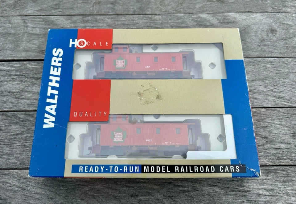 Walthers 932-27514 30' Caboose (3 Window Offset Cupola) 2-pack Central Vermont - Image 1 of 4