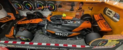 Maisto Formula 1 R/C 1:10 McLaren Lando Norris #4 JUEGO DE RUEDAS EXTRA Y HERRAMIENTA DE BOXO Foto 1 de 4
