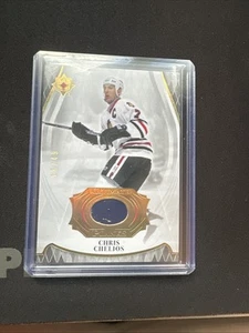 2023-24 Ultimate Collection Ultimate Planks Chris Chelios #/49 No. PL-CC CHICAGO - Picture 1 of 2