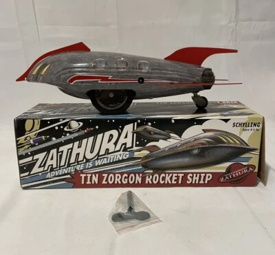 SCHYLLING ZATHURA HOJALATA ZORGON COHETE CUERDA JUGUETE 2005 nuevo en caja Foto 1 de 4